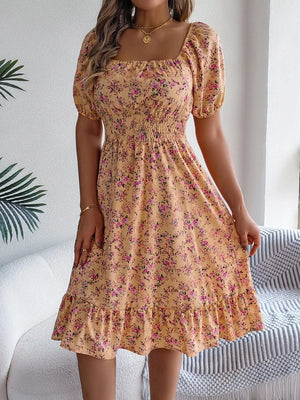 Blommig off-shoulder midiklänning