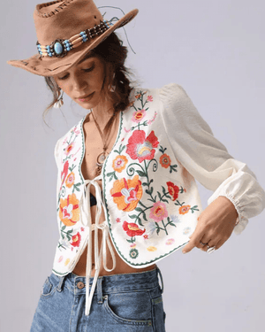 Broderad blus med blommor