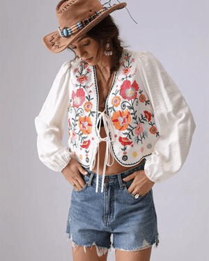 Broderad blus med blommor