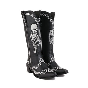 Cowboyboots med broderad skelettdesign och chunky klack