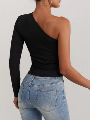 Svart asymmetrisk blus med en ärm