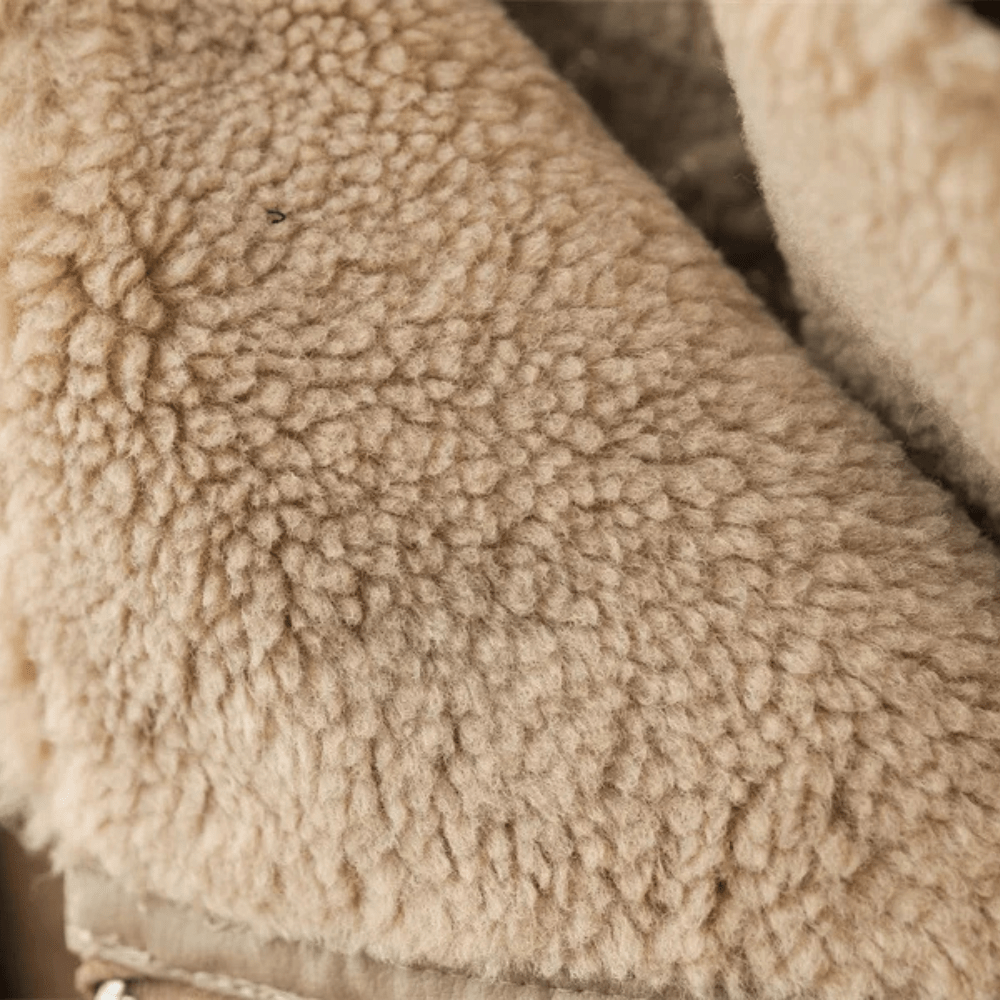 Beige shearlingjacka