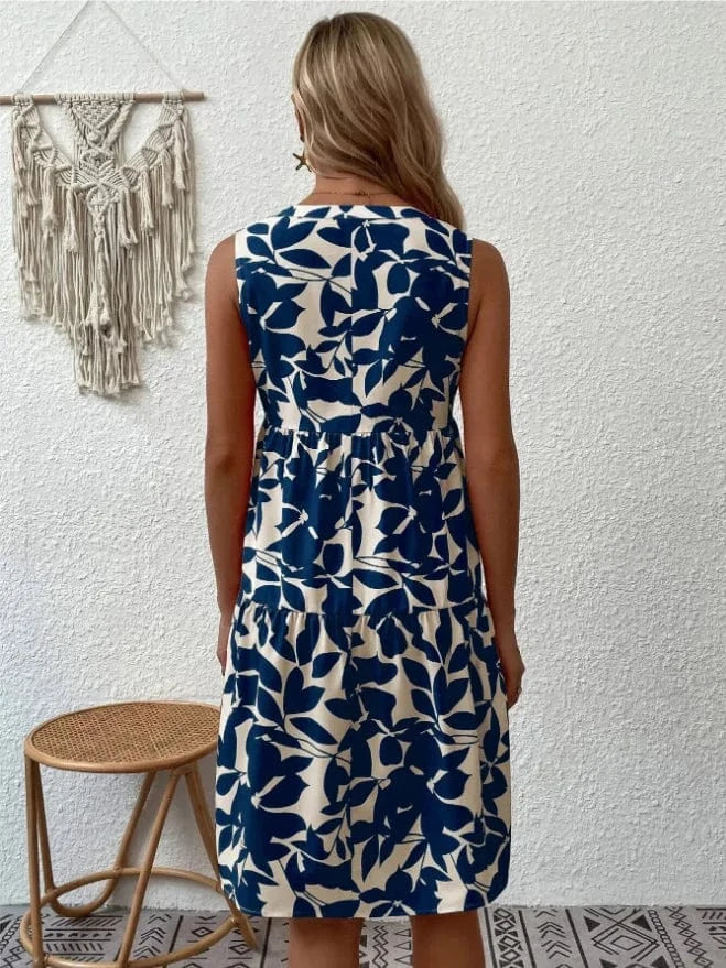 Blommig klänning knälång