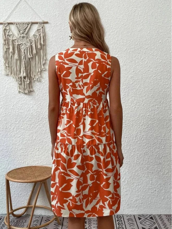 Blommig klänning knälång