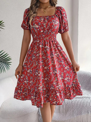 Blommig off-shoulder midiklänning
