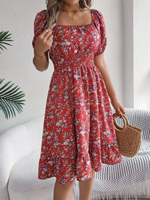 Blommig off-shoulder midiklänning