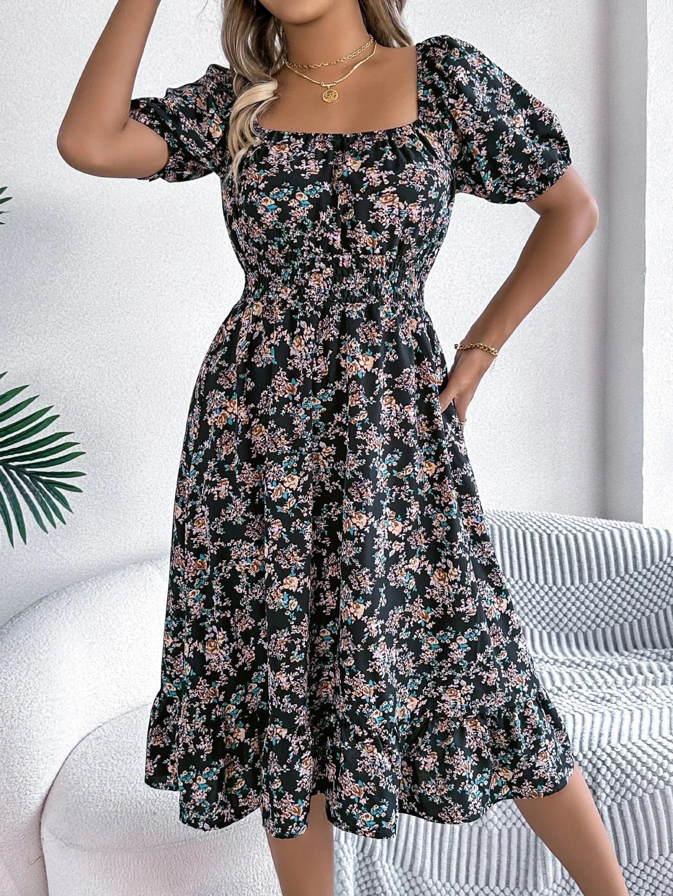 Blommig off-shoulder midiklänning Svart / S