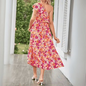 Blommig one shoulder-klänning