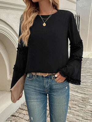 Blus med trumpetärm