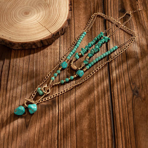 Boho halsband med western-berlocker