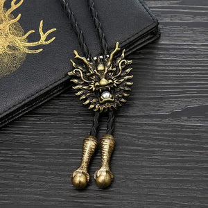 Bolo tie i läder med drakhuvud i metall