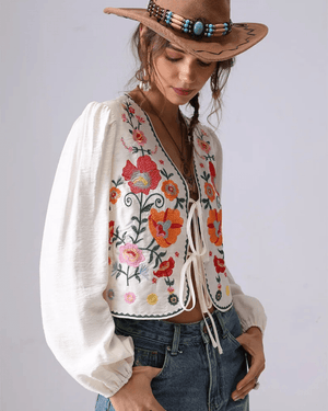 Broderad blus med blommor