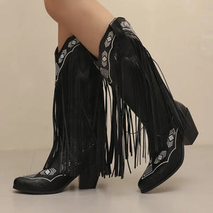 Cowboyboots med tofsar i mjukt läder och broderade detaljer