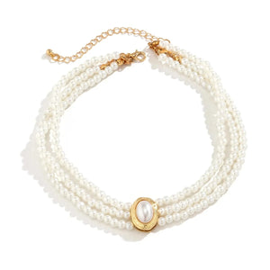Flerradigt choker-halsband med turkosa pärlor