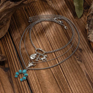 Flerradigt halsbandsset i western stil med turkos och cowboy-berlocker Silver med 3st