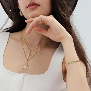 Guldpläterat westernhalsband med initial