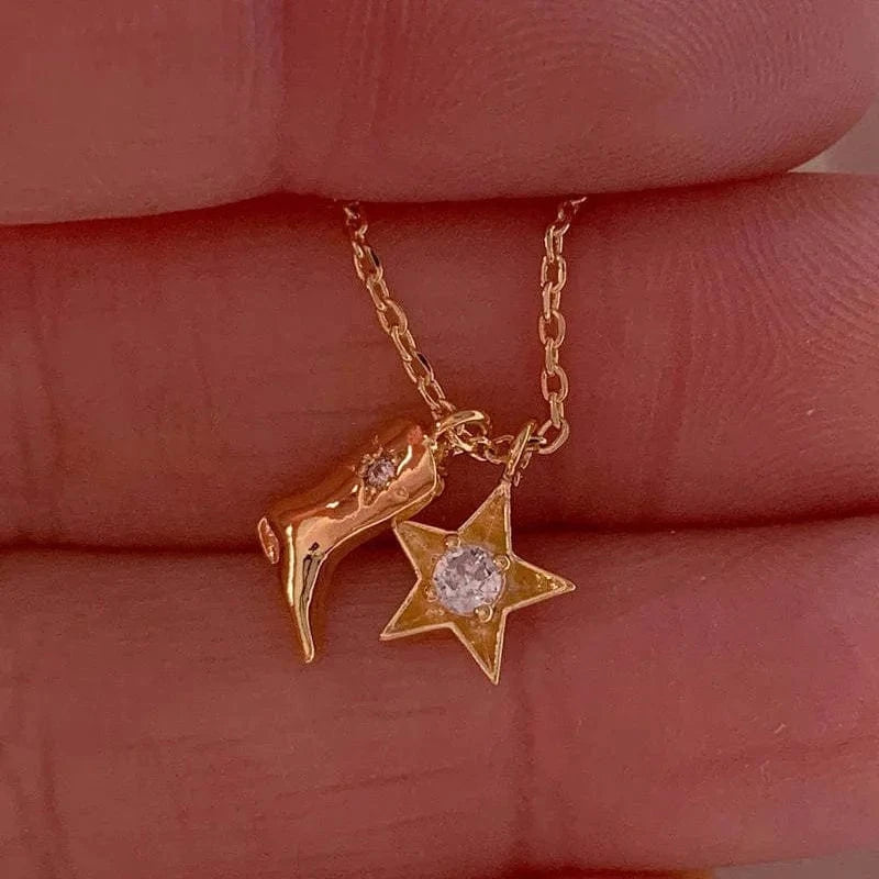 Halsband med hänge i form av en cowboyboots och stjärna Guld