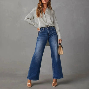 Högmidjade mörkblå vida jeans för dam