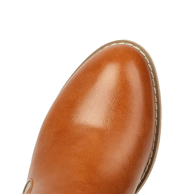 Låga Cowboyboots i västernstil med utskuret mönster och blockklack