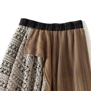 Långkjol i patchwork-stil med spets och rutigt mönster