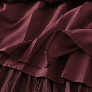 Maxikjol i plisserad skinnimitation