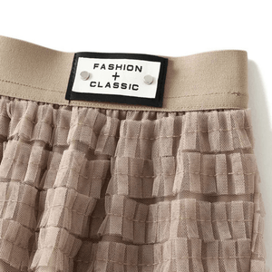 Maxikjol med en böljande kaskad av tyll