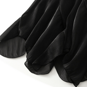 Midikjol med asymmetrisk drapering