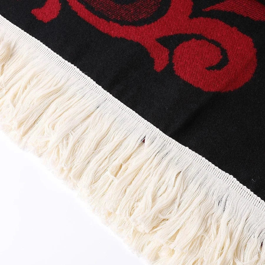 Poncho med fransar