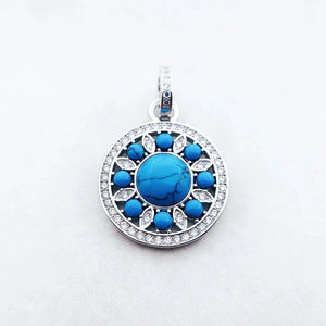 Rund silverberlock med turkos och strass Silver med turkos